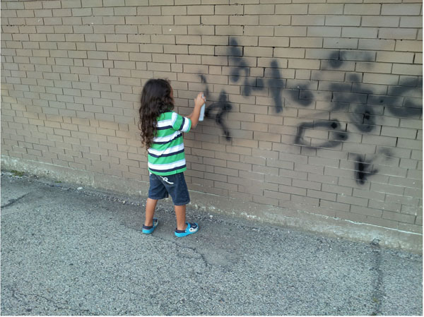 jux_kid_sprayin