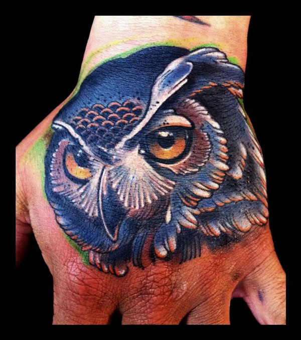traditional-owl-hand-tattoo-color-brent-olson-art-junkies-tattoo