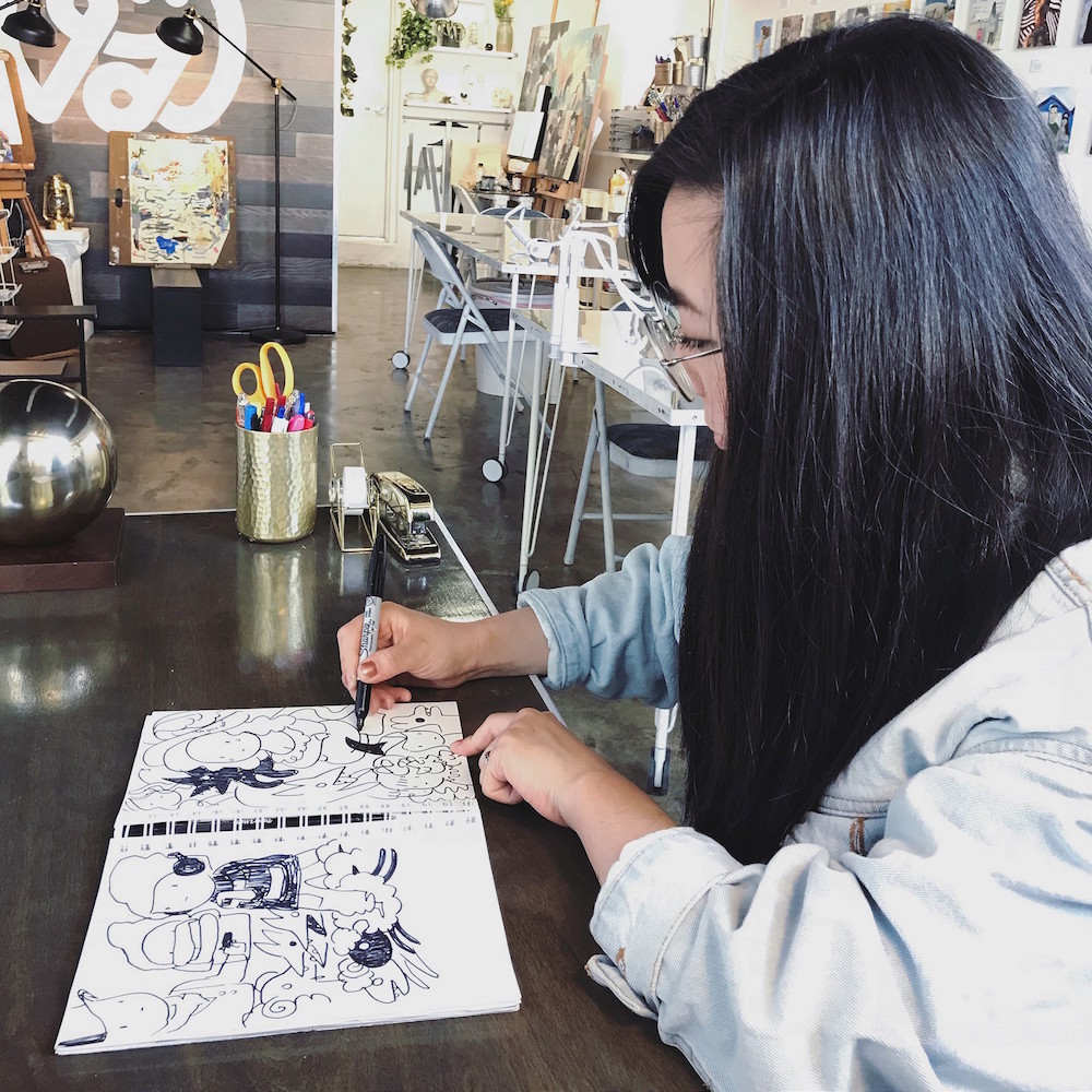 Trisha working on unknown sketches