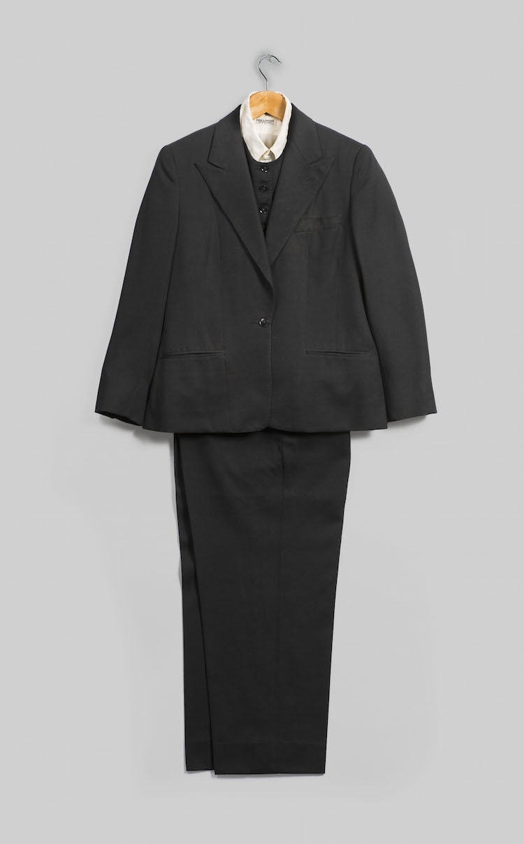 Emsley. Suit (Jacket, Pants, and Vest), 1983. Black wool. Inner garment: Lord & Taylor. Shirt, circa 1960s. White cotton. Georgia O’Keeffe Museum, Gift of Juan and Anna Marie Hamilton, 2000.03.0384, 2000.03.0393, 2000.03.0386, and 2000.03.0239. (Photo © Georgia O’Keeffe Museum)