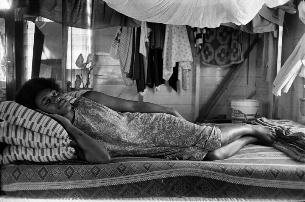 Carrie Mae Weems (American, b. 1953). Reclining Girl, Fiji, 1982–83. Gelatin silver print, 5 5/16 x 8 15/16 inches. © Carrie Mae Weems. Courtesy of the artist and Jack Shainman Gallery, New York.