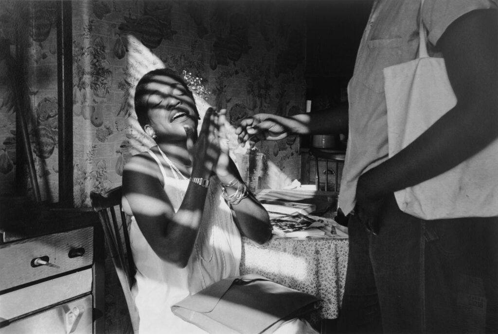 Dawoud Bey (American, b. 1953). The Woman in the Light, Harlem, NY, 1980. Gelatin silver print, 20 x 24 inches. © Dawoud Bey. Courtesy of Stephen Daiter Gallery.