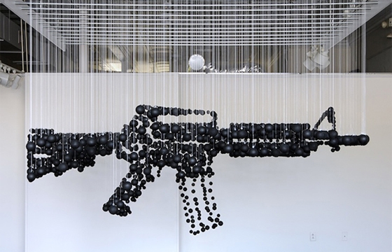 Assault Rifle Graphic Illusion Made From Ping Pong Balls