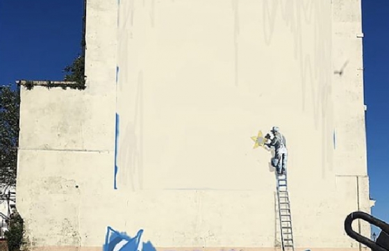 Raising the White Flag: Banksy's "Brexit" Mural Gets Painted Over and Proves Its Point