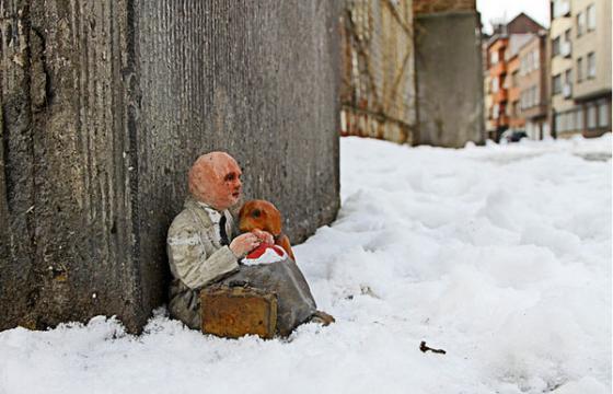 Miniature Homeless man by Isaac Cordal