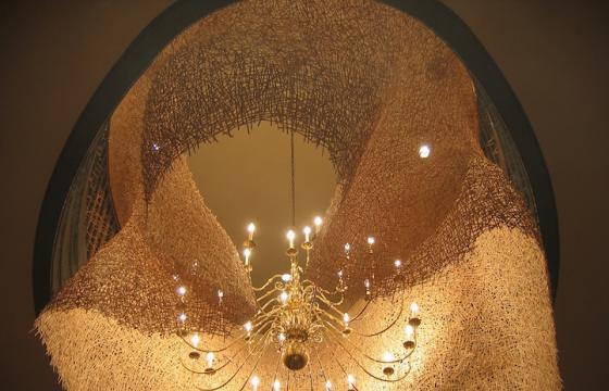 Woven Installation of 60,000 Coffee Stirrers