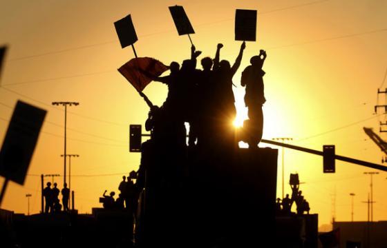 Occupy the Port: General Strike Halts Shipping, Police Strike Back