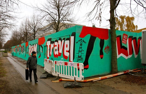 Steve Powers paints wall in front of the U.S. Embassy in Copenhagen