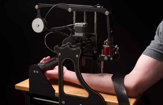 The Robotic Tattoo Machine that Randomly Tattoos Your Favorite Religious Symbol