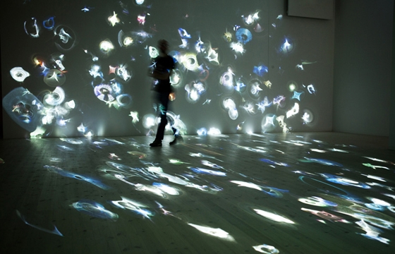 Daniel Canogar projects footage from 360 DVDs back onto their surfaces