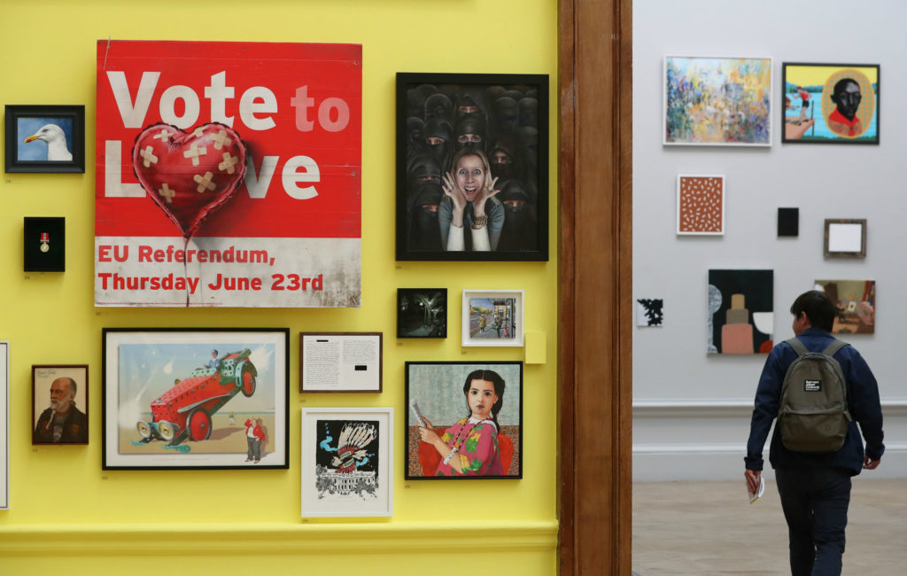 Banksy’s Vote to Love in the “Summer Exhibition” at the Royal Academy of Arts. Photo by Daniel Leal-Olivas/AFP/Getty Images. via artnet