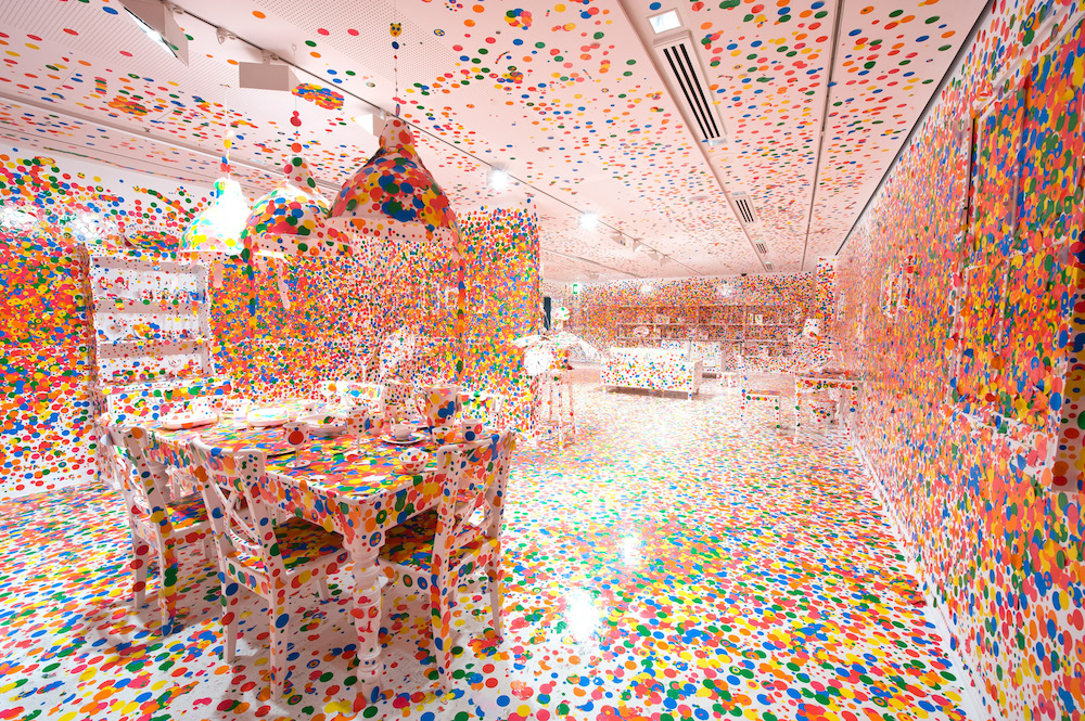 The Obliteration Room, 2002 to present. Yayoi Kusama (Japanese, b. 1929). Furniture, white paint, and dot stickers; dimensions variable. Collaboration between Yayoi Kusama and Queensland Art Gallery. Commissioned Queensland Art Gallery, Australia. Gift of the artist through the Queensland Art Gallery Foundation 2012. Collection: Queensland Art Gallery, Brisbane, Australia. Photograph: QAGOMA. © Yayoi Kusama