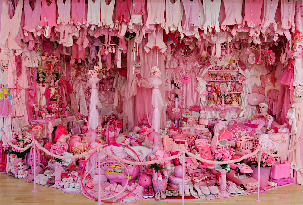 Pink Project; Bedroom, 2011-ongoing, found pink plastic and synthetic objects along with salvaged pink bedroom furnishing, 8ft high x 18 ft wide x 10 ft deep, image courtesy of the artist.