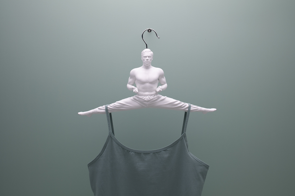"JEAN’S CLOTHES VAN DAMME" Jean Claude van Damme’s epic, signature move immortalized by a clothes hanger.