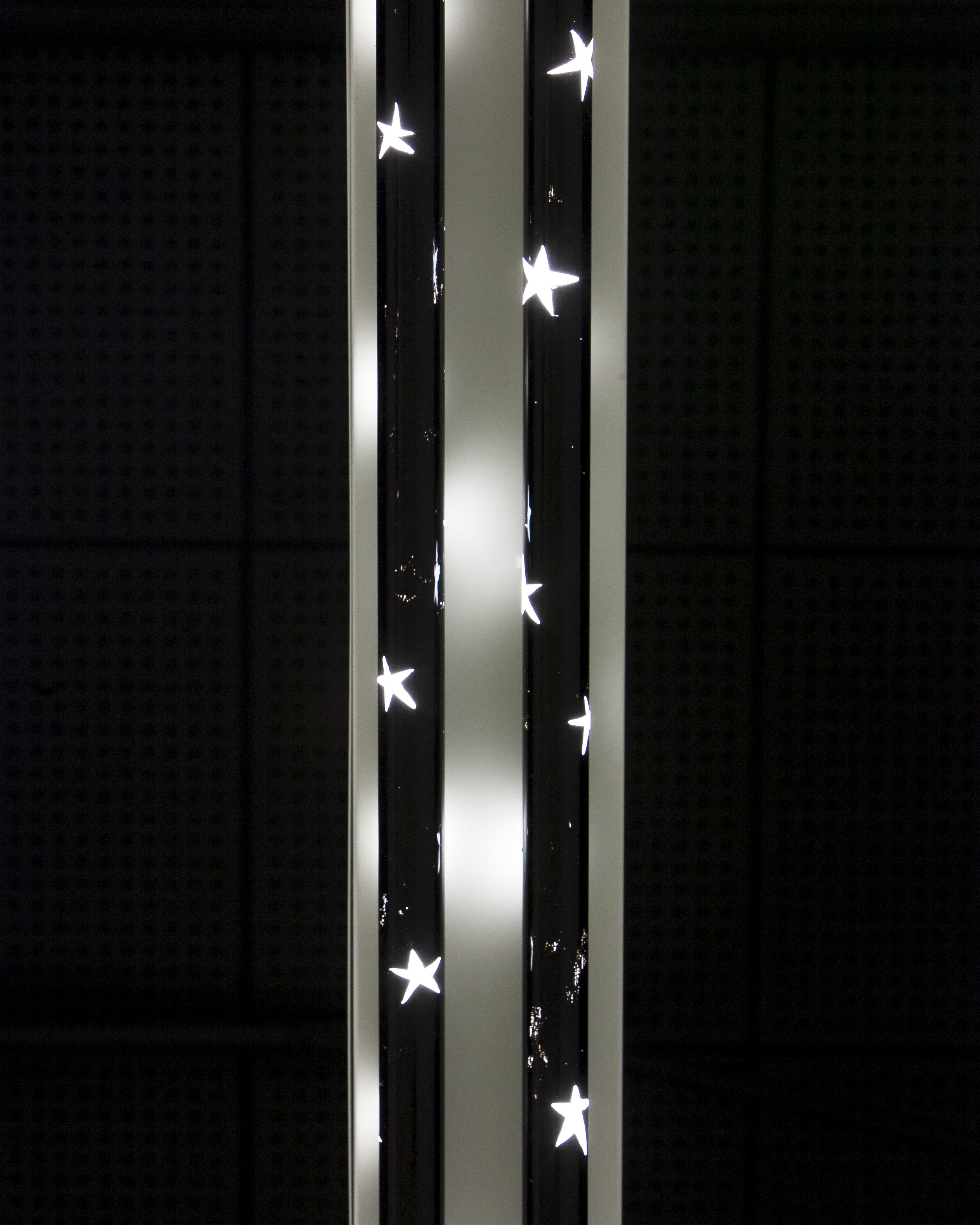 ”Darkstarlight,” 2019. Glass Enamel Paint, Fluorescent Light Bulb. 2 x 2 x 96 Inches (2).