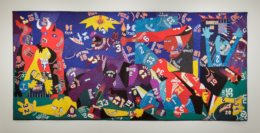 "Guernica," 2016. Mixed media including sport jerseys. 131 x 281 inches © Hank Willis Thomas, courtesy of the artist and Jack Shainman Gallery, New York. 