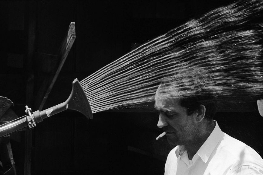 Jean Tinguely with Sprinkler, 1963