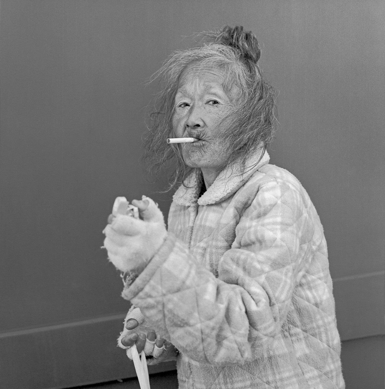 A lady smoking hi-lite, 2011
