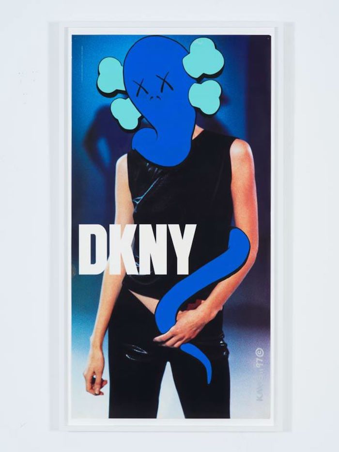 KAWS (American, born 1974). UNTITLED (DKNY), 1997. Acrylic on existing advertising poster, 49 7/8 × 25 7/8 in. (126.7 × 65.7 cm). © KAWS. (Photo: Farzad Owrang)