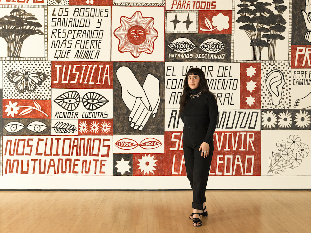 Liz Hernández in front of Conjuro para la sanación de nuestro futuro (A spell for the healing of our future), 2020 (detail); commissioned by the San Francisco Museum of Modern Art, courtesy the artist; photo: Katherine Du Tiel, courtesy SFMOMA