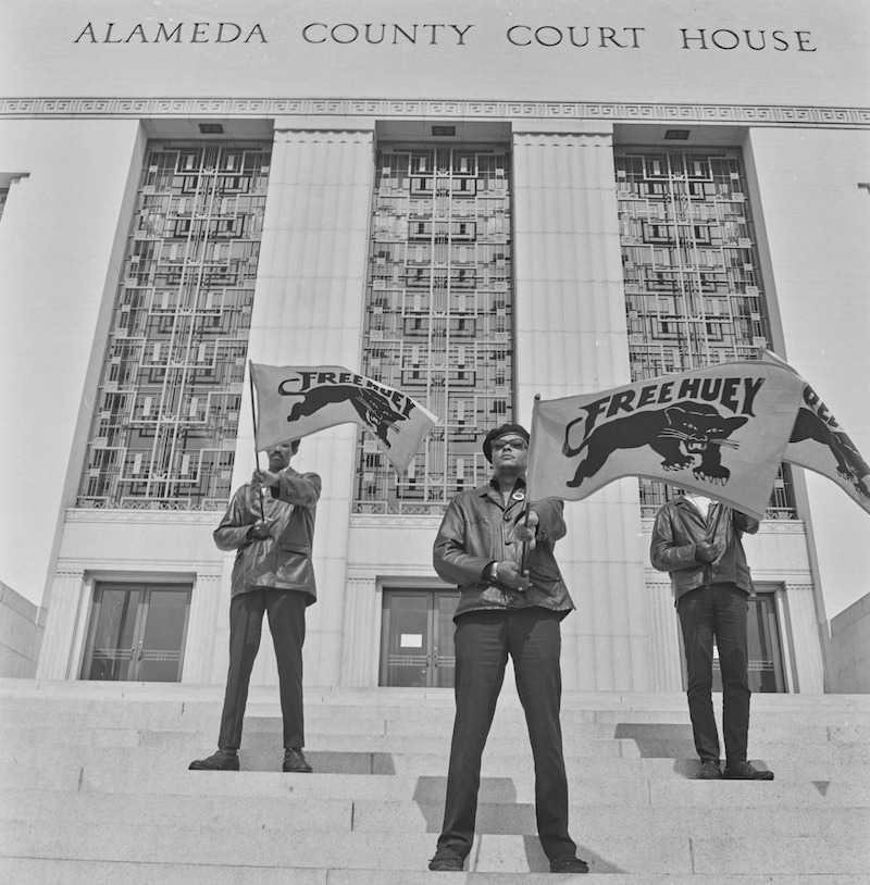 Pirkle Jones, "#71 from A Photographic Essay on The Black Panthers" (Black Panther demonstration, Alameda County Court House, Oakland, California, during Huey Newton