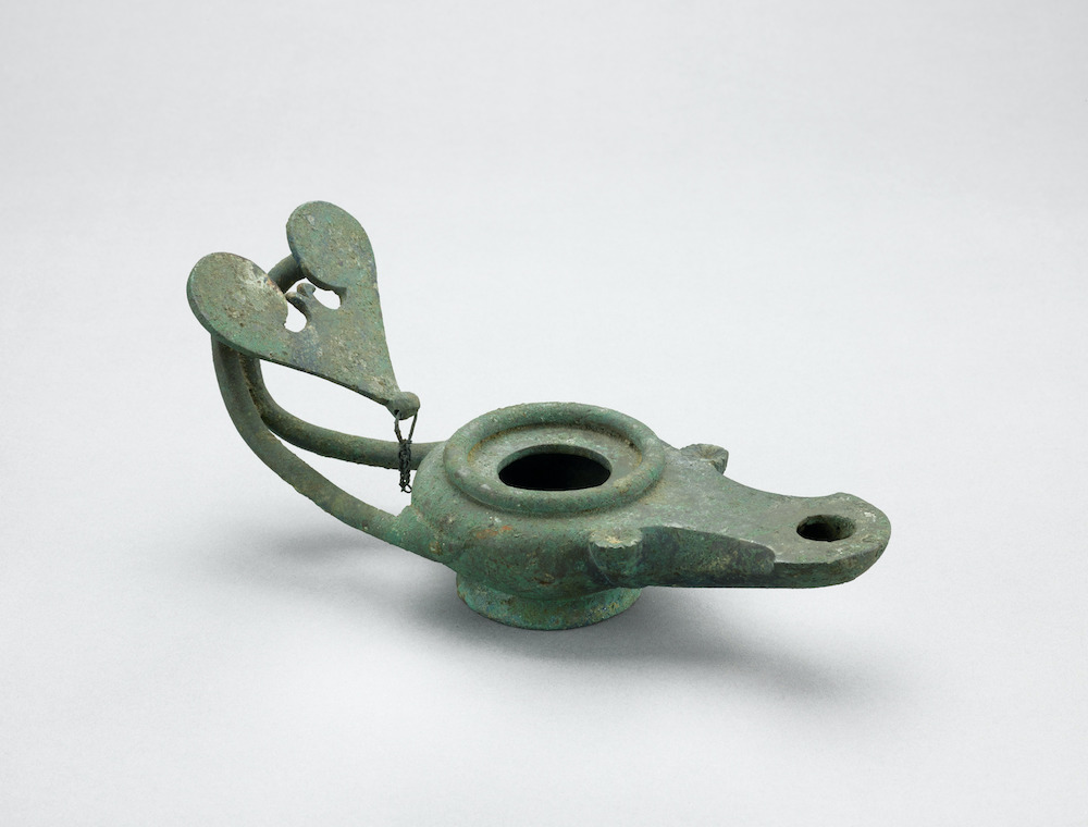 Boat-shaped lamp, AD 50–75 Bronze 3 3/4 x 9 x 3 3/8 in. (9.5 x 22.9 x 8.6 cm) Ashmolean Museum of Art and Archaeology, Bequeathed by C. D. E. Fortnum, 1888 ANFortnum B.186  Image courtesy of the Fine Arts Museums of San Francisco