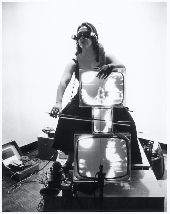 CharlotteMoormanwithTVCelloandTVEyeglasses,1971;PeterWenzelCollection,Witten, Germany; © 2021 Barbara Moore / Licensed by VAGA at Artists Rights Society (ARS), NY, Courtesy Paula Cooper Gallery, New York