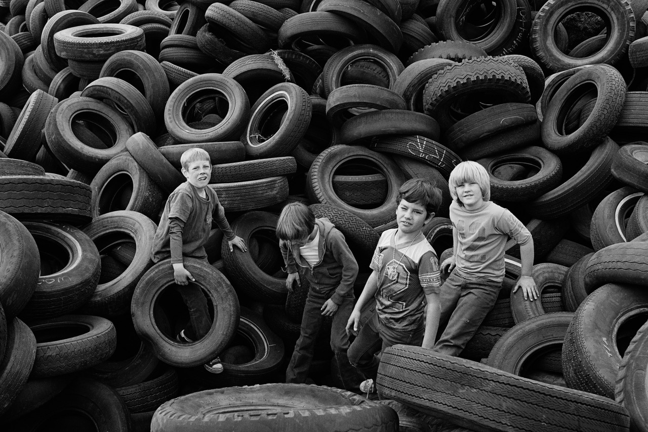 Boys and Tires Sears Point, 1976 © Mimi Plumb