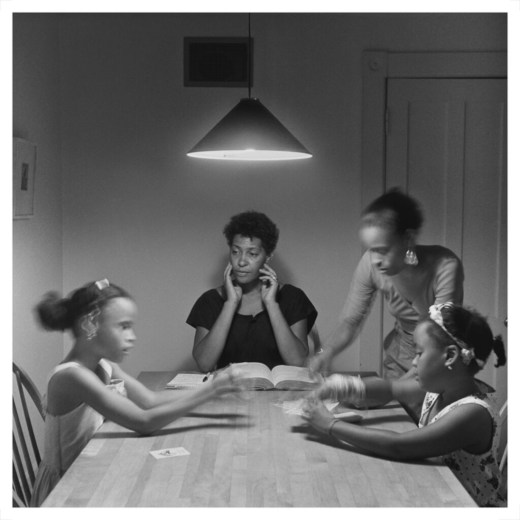 Carrie Mae Weems (American, b. 1953). Untitled (Woman and Daughter with Children) from The Kitchen Table Series, 1990. Gelatin silver print, 27 ¼ x 27 1/4. © Carrie Mae Weems. Courtesy of the artist and Jack Shainman Gallery, New York.