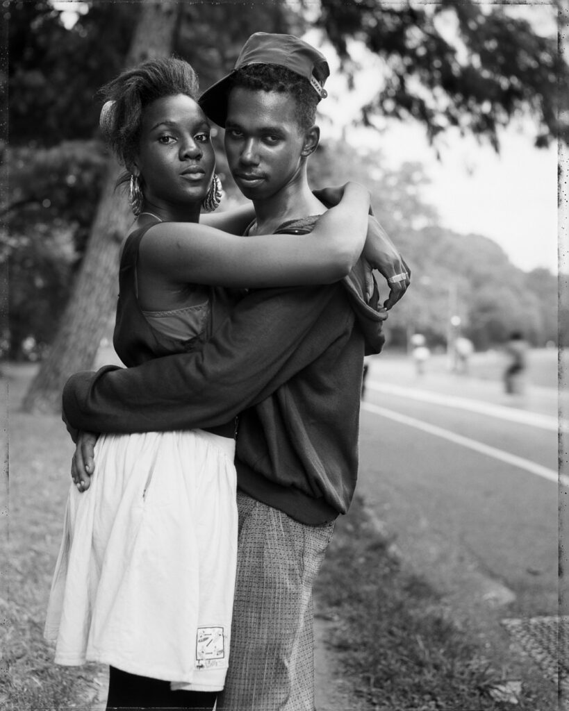 Dawoud Bey (American, b. 1953). Couple in Prospect Park, 1990 (printed 2018). Gelatin silver print, 21 7/8 x 17 1/2 inches. Grand Rapids Art Museum, Museum Purchase, 2018.22. © Dawoud Bey. Courtesy of Stephen Daiter Gallery.