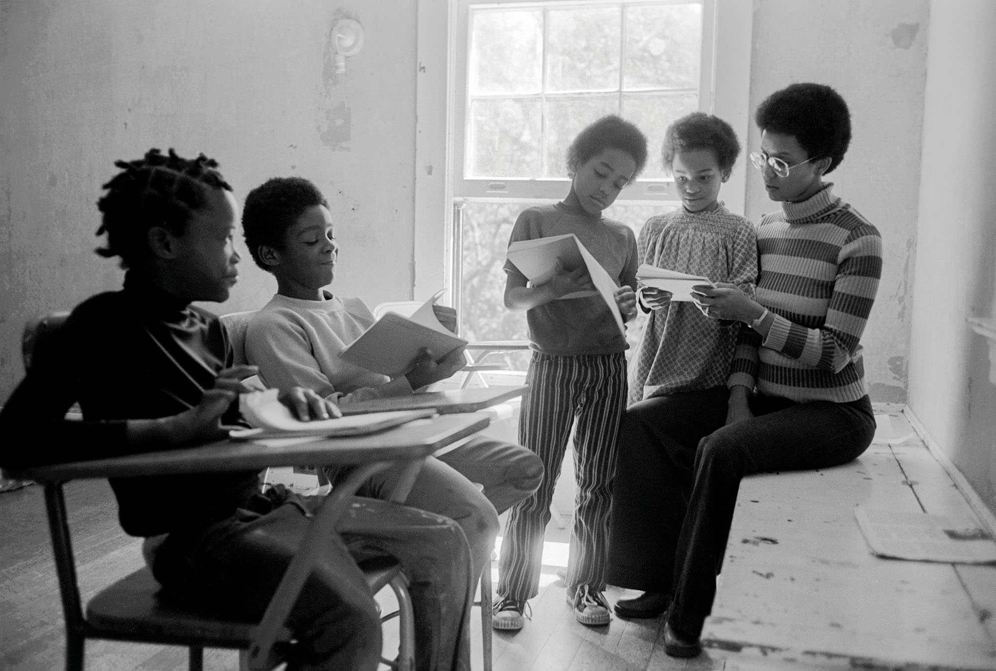 1972 - Oakland, California: Black Panther children in a classroom with their teacher, Evon Carter, widow of Alprentice "Bunchy" Carter, at the Intercommunal Youth Institute, the Black Panther school.