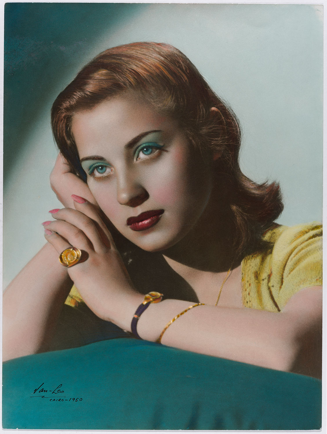 Van Leo, Miss Iliana. Italian. Hands on side of face, 1950