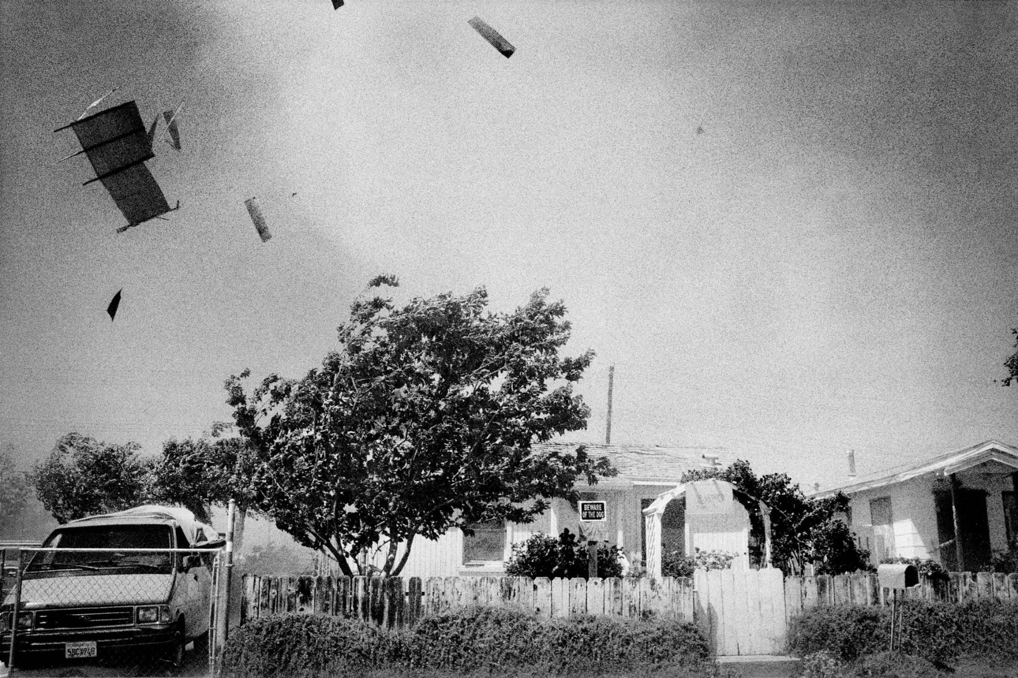 Avenal, California. 2009. Dust storm rips off a roof., 2009