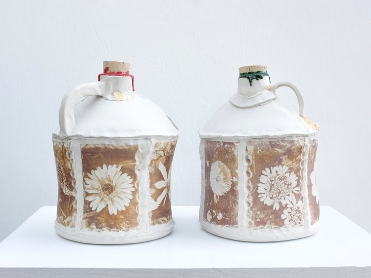 Pat McCarthy, Porcelain jugs, 2025 Photocopy toner fired onto English Porcelain, gold leaf, cork, wax 12 x 9 x 9 inches (each)