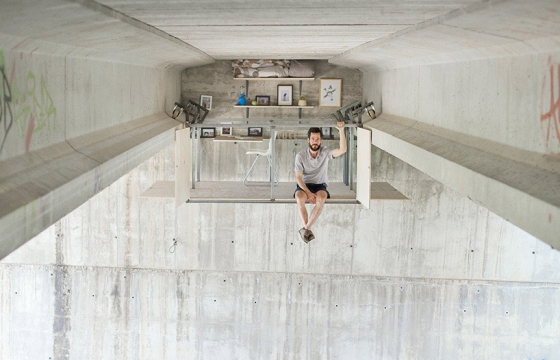 Fernando Abellanas builds a Secret studio beneath overpass