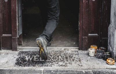 Pejac Creates Quite a "WELCOME" Mural for Nuart Aberdeen